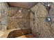 Large walk-in shower with multiple shower heads and built in bench at 10170 Cedar Grove Rd, Chattahoochee Hills, GA 30213