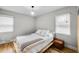 Light and airy bedroom with hardwood floors and a platform bed at 2930 Kimmeridge Dr, Atlanta, GA 30344