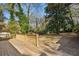 Wooden deck overlooking large backyard and trees at 2930 Kimmeridge Dr, Atlanta, GA 30344