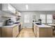 Modern kitchen with light wood cabinets and a large island at 2930 Kimmeridge Dr, Atlanta, GA 30344