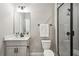 Modern bathroom with gray tile shower and floating vanity at 1095 Tucker Ave # 501, Atlanta, GA 30310