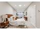 Bright bedroom with a queen-size bed and an en-suite bathroom at 1095 Tucker Ave # 501, Atlanta, GA 30310