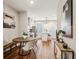 Modern dining area with round wooden table and built-in bench seating at 1095 Tucker Ave # 501, Atlanta, GA 30310