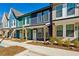 Row of colorful townhouses with inviting front porches at 1095 Tucker Ave # 501, Atlanta, GA 30310