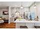 Modern kitchen with stainless steel appliances and white quartz countertops at 1095 Tucker Ave # 501, Atlanta, GA 30310