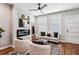 Bright living room featuring hardwood floors and a modern fireplace at 1095 Tucker Ave # 501, Atlanta, GA 30310
