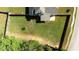Aerial view showing house and fenced backyard at 307 Cinnamon Bark Pass, Locust Grove, GA 30248