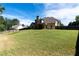 Large backyard with home view and fenced perimeter at 307 Cinnamon Bark Pass, Locust Grove, GA 30248