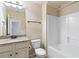 Simple bathroom with granite countertop and bathtub at 307 Cinnamon Bark Pass, Locust Grove, GA 30248