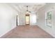Main bedroom with carpet, tray ceiling and ceiling fan at 307 Cinnamon Bark Pass, Locust Grove, GA 30248