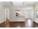 Kitchen with white cabinets, granite countertops, and an island at 307 Cinnamon Bark Pass, Locust Grove, GA 30248