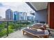 Relaxing balcony space featuring lounge chairs, amazing views, and a modern design at 40 12Th Ne St # 1701, Atlanta, GA 30309