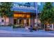Striking building entrance at 40 West 12th, surrounded by lush landscaping at 40 12Th Ne St # 1701, Atlanta, GA 30309