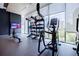 Well-equipped gym featuring modern exercise equipment and expansive city views at 40 12Th Ne St # 1701, Atlanta, GA 30309