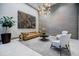Contemporary lobby boasts stylish seating, unique light fixtures, and modern artwork at 40 12Th Ne St # 1701, Atlanta, GA 30309