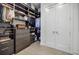 Large walk-in closet featuring built-in shelves and drawers at 40 12Th Ne St # 1701, Atlanta, GA 30309