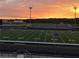 Football field at sunset at 106 Laurel Brook Ln, Canton, GA 30115