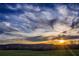 Sunset over a field and trees at 106 Laurel Brook Ln, Canton, GA 30115