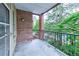 Brick balcony overlooks a community pool and provides a relaxing outdoor space at 1735 Peachtree Ne St # 129, Atlanta, GA 30309