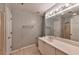 Bathroom with vanity, mirror, and shower/tub combo at 1735 Peachtree Ne St # 129, Atlanta, GA 30309