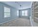 Bright bedroom with built-in bookshelves and carpet at 1735 Peachtree Ne St # 129, Atlanta, GA 30309