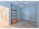 Spacious bedroom with ceiling fan and built-in shelving at 1735 Peachtree Ne St # 129, Atlanta, GA 30309