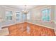 Bright dining room with hardwood floors and french doors at 1735 Peachtree Ne St # 129, Atlanta, GA 30309