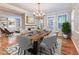 Elegant dining room featuring hardwood floors and a chandelier at 1735 Peachtree Ne St # 129, Atlanta, GA 30309