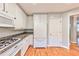 Kitchen with white cabinets, granite countertops and appliances at 1735 Peachtree Ne St # 129, Atlanta, GA 30309