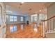 Spacious living room featuring hardwood floors and a fireplace at 1735 Peachtree Ne St # 129, Atlanta, GA 30309