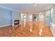 Living room with hardwood floors, fireplace, and built-ins at 1735 Peachtree Ne St # 129, Atlanta, GA 30309