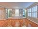 Bright living room with hardwood floors and built-in shelving at 1735 Peachtree Ne St # 129, Atlanta, GA 30309