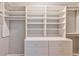 Large walk-in closet with shelving and drawers at 1735 Peachtree Ne St # 129, Atlanta, GA 30309