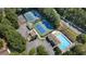 Aerial view of community amenities, including tennis courts and pool at 4187 Westchester Ne Trce, Roswell, GA 30075