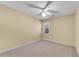 Bright bedroom featuring a ceiling fan and ample space at 4187 Westchester Ne Trce, Roswell, GA 30075