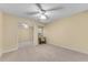 Spacious bedroom with a ceiling fan and mirrored closet at 4187 Westchester Ne Trce, Roswell, GA 30075