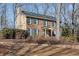 Two-story brick house with green shutters at 4187 Westchester Ne Trce, Roswell, GA 30075