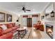 Living room features hardwood floors, fireplace and large windows at 4187 Westchester Ne Trce, Roswell, GA 30075