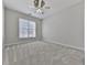 Spacious bedroom with ceiling fan and window blinds at 4251 Sheffield Nw Ct, Kennesaw, GA 30144