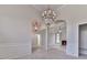 Elegant dining room with chandelier and arches at 4251 Sheffield Nw Ct, Kennesaw, GA 30144