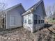 Gray house with sunroom addition, and landscaping at 4251 Sheffield Nw Ct, Kennesaw, GA 30144