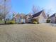 Brick house with two-car garage and landscaping at 4251 Sheffield Nw Ct, Kennesaw, GA 30144