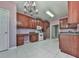 Kitchen with dark wood cabinets and granite countertops at 4251 Sheffield Nw Ct, Kennesaw, GA 30144