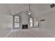 Living room with a fireplace and vaulted ceiling at 4251 Sheffield Nw Ct, Kennesaw, GA 30144