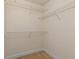 Large walk-in closet with wire shelving at 1004 Masons Creek Cir # 1004, Atlanta, GA 30350