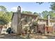 Townhouse exterior with wood siding and private yard at 1004 Masons Creek Cir # 1004, Atlanta, GA 30350