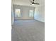 Large bedroom with ceiling fan and grey carpeting at 168 Silvercrest Dr, Acworth, GA 30101