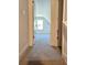 Hallway with carpet and doors leading to bedrooms at 168 Silvercrest Dr, Acworth, GA 30101