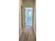 Hallway with wood-look flooring and bedroom access at 168 Silvercrest Dr, Acworth, GA 30101