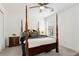 Bright bedroom with a post bed and plenty of natural light at 2024 Gramercy Cir, Atlanta, GA 30341